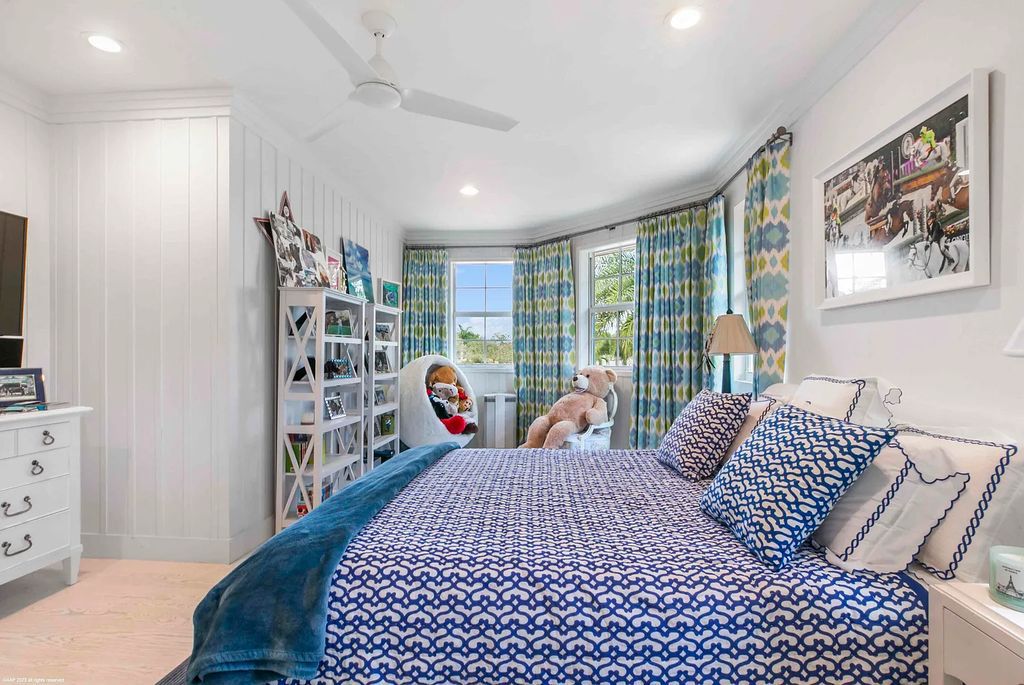 This luxurious 5-bedroom, 6.5-bathroom pool home is located in the Equestrian Club Estates in 14310 Calypso Lane, Wellington, Florida. The house offers 7,173 square feet of living space on a spacious 0.49-acre lot. Built-in 2000, the property has been completely renovated with high-end finishes throughout.