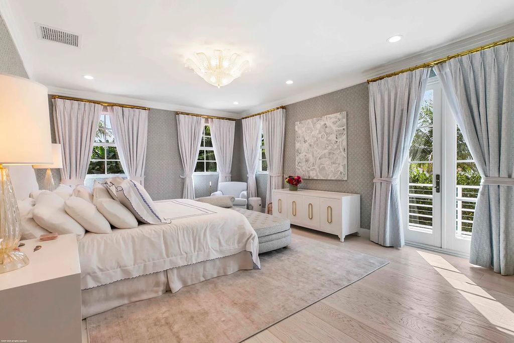 This luxurious 5-bedroom, 6.5-bathroom pool home is located in the Equestrian Club Estates in 14310 Calypso Lane, Wellington, Florida. The house offers 7,173 square feet of living space on a spacious 0.49-acre lot. Built-in 2000, the property has been completely renovated with high-end finishes throughout.