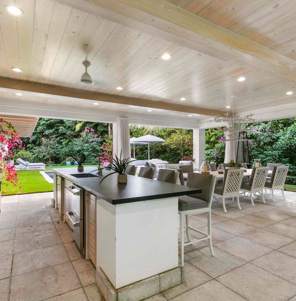 This luxurious 5-bedroom, 6.5-bathroom pool home is located in the Equestrian Club Estates in 14310 Calypso Lane, Wellington, Florida. The house offers 7,173 square feet of living space on a spacious 0.49-acre lot. Built-in 2000, the property has been completely renovated with high-end finishes throughout.