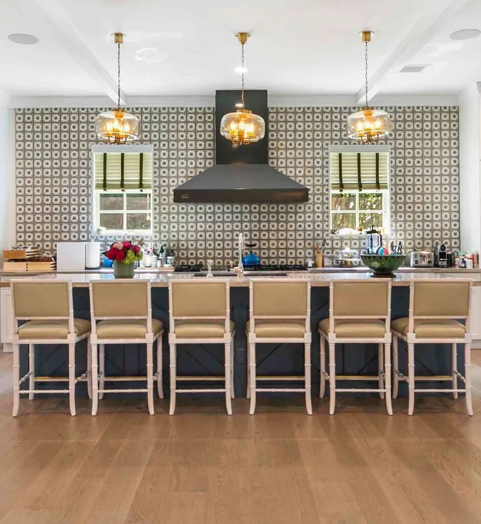 This luxurious 5-bedroom, 6.5-bathroom pool home is located in the Equestrian Club Estates in 14310 Calypso Lane, Wellington, Florida. The house offers 7,173 square feet of living space on a spacious 0.49-acre lot. Built-in 2000, the property has been completely renovated with high-end finishes throughout.
