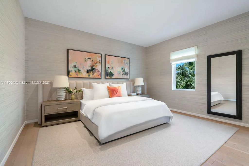 Welcome to 815 E Dilido Drive, Miami Beach, Florida, a stunning transitional home designed by Menin Design. This hme in Miami Beach boasts 6 bedrooms and 8 bathrooms, with a living space of 8,181 square feet, all situated on a spacious 0.31-acre lot. Built in 2006, this home is one of the most impressive properties on the Venetian, offering 107 feet of waterfront living.