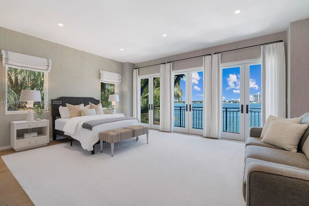 Welcome to 815 E Dilido Drive, Miami Beach, Florida, a stunning transitional home designed by Menin Design. This hme in Miami Beach boasts 6 bedrooms and 8 bathrooms, with a living space of 8,181 square feet, all situated on a spacious 0.31-acre lot. Built in 2006, this home is one of the most impressive properties on the Venetian, offering 107 feet of waterfront living.