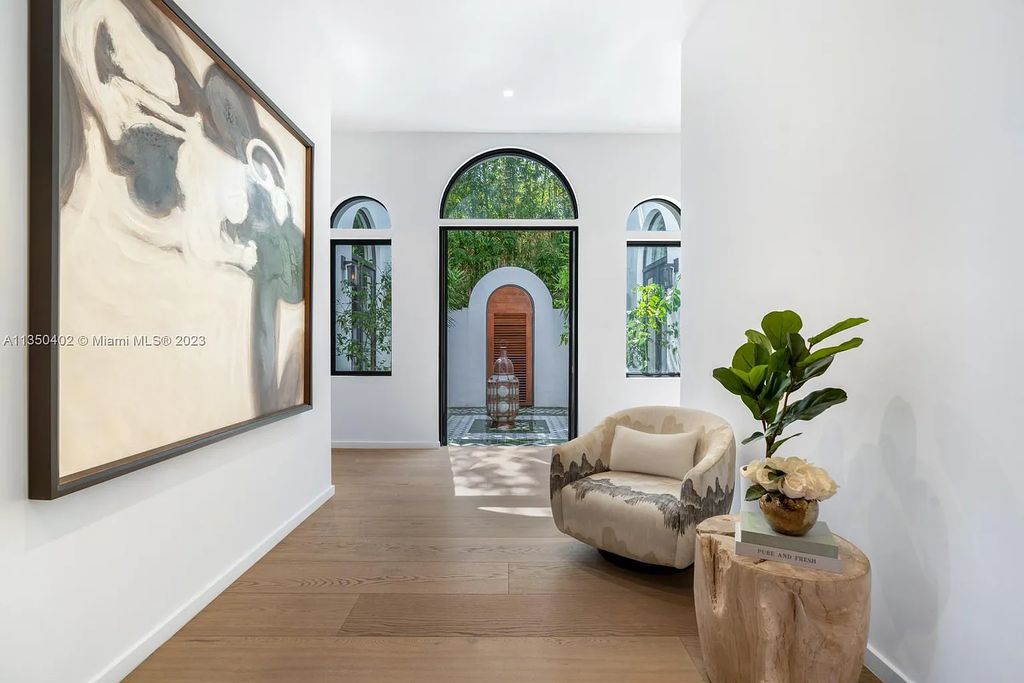 Welcome to 815 E Dilido Drive, Miami Beach, Florida, a stunning transitional home designed by Menin Design. This hme in Miami Beach boasts 6 bedrooms and 8 bathrooms, with a living space of 8,181 square feet, all situated on a spacious 0.31-acre lot. Built in 2006, this home is one of the most impressive properties on the Venetian, offering 107 feet of waterfront living.
