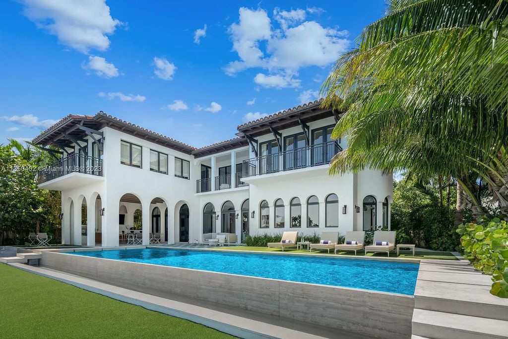 Welcome to 815 E Dilido Drive, Miami Beach, Florida, a stunning transitional home designed by Menin Design. This hme in Miami Beach boasts 6 bedrooms and 8 bathrooms, with a living space of 8,181 square feet, all situated on a spacious 0.31-acre lot. Built in 2006, this home is one of the most impressive properties on the Venetian, offering 107 feet of waterfront living.