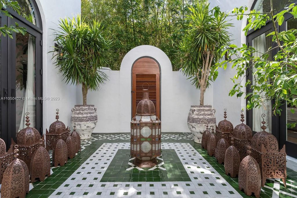 Welcome to 815 E Dilido Drive, Miami Beach, Florida, a stunning transitional home designed by Menin Design. This hme in Miami Beach boasts 6 bedrooms and 8 bathrooms, with a living space of 8,181 square feet, all situated on a spacious 0.31-acre lot. Built in 2006, this home is one of the most impressive properties on the Venetian, offering 107 feet of waterfront living.