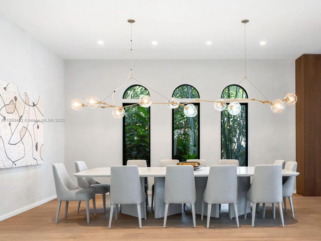 Welcome to 815 E Dilido Drive, Miami Beach, Florida, a stunning transitional home designed by Menin Design. This hme in Miami Beach boasts 6 bedrooms and 8 bathrooms, with a living space of 8,181 square feet, all situated on a spacious 0.31-acre lot. Built in 2006, this home is one of the most impressive properties on the Venetian, offering 107 feet of waterfront living.