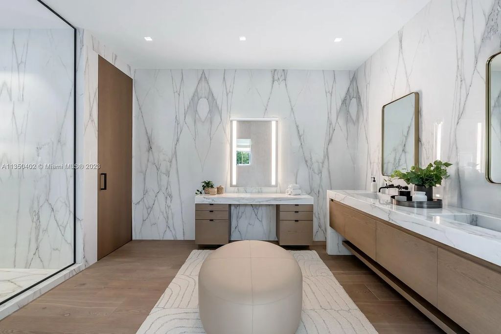Welcome to 815 E Dilido Drive, Miami Beach, Florida, a stunning transitional home designed by Menin Design. This hme in Miami Beach boasts 6 bedrooms and 8 bathrooms, with a living space of 8,181 square feet, all situated on a spacious 0.31-acre lot. Built in 2006, this home is one of the most impressive properties on the Venetian, offering 107 feet of waterfront living.