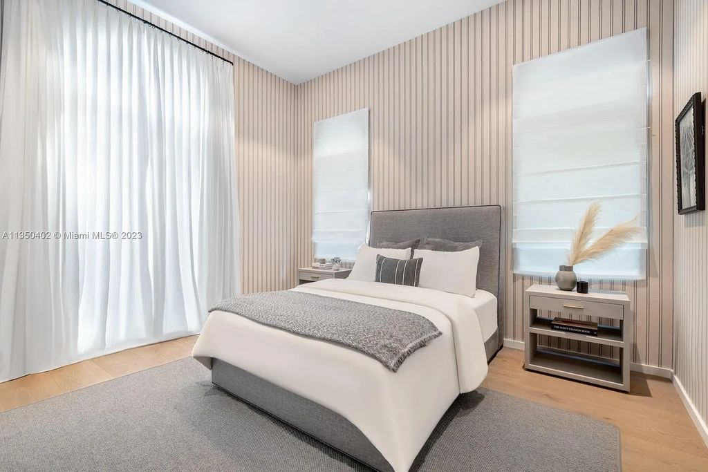 Welcome to 815 E Dilido Drive, Miami Beach, Florida, a stunning transitional home designed by Menin Design. This hme in Miami Beach boasts 6 bedrooms and 8 bathrooms, with a living space of 8,181 square feet, all situated on a spacious 0.31-acre lot. Built in 2006, this home is one of the most impressive properties on the Venetian, offering 107 feet of waterfront living.