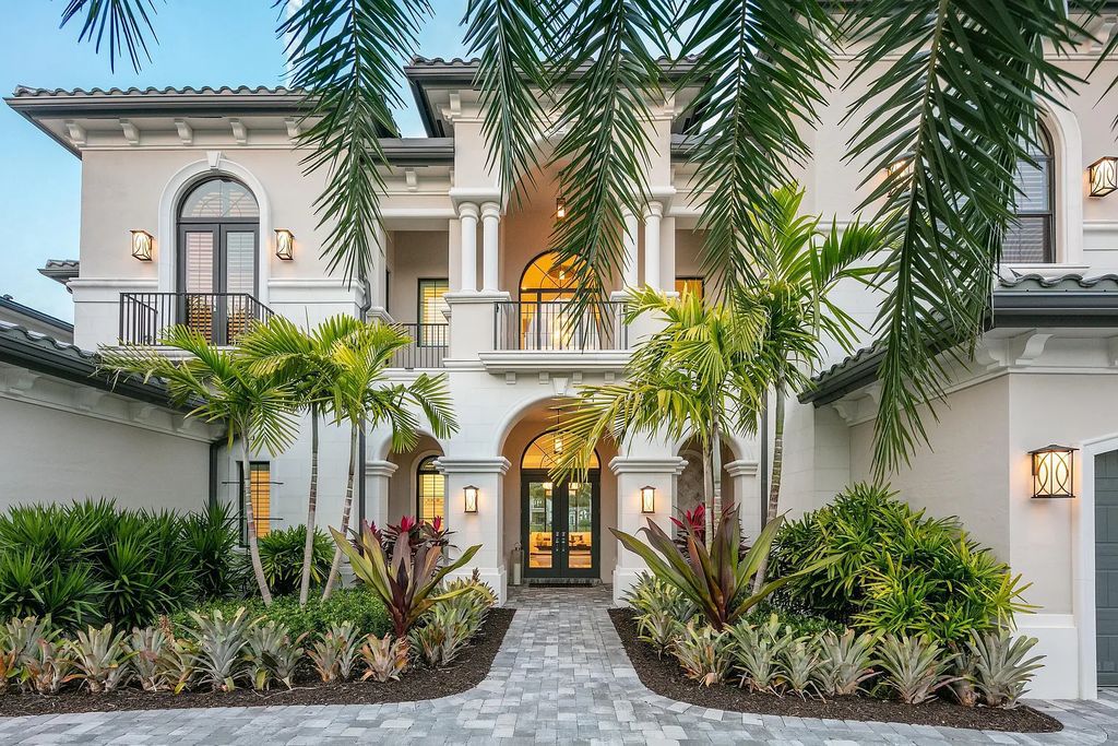 This 6-bedroom, 8-bathroom palazzo estate is located at 17206 Brulee Breeze Way, Boca Raton, Florida, and boasts 7,732 square feet of luxurious living space. The house is designed to offer clean lines, sophisticated design, and stunning finishes, with each space masterfully curated for luxurious living and gracious entertaining.