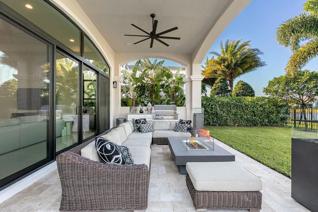 This 6-bedroom, 8-bathroom palazzo estate is located at 17206 Brulee Breeze Way, Boca Raton, Florida, and boasts 7,732 square feet of luxurious living space. The house is designed to offer clean lines, sophisticated design, and stunning finishes, with each space masterfully curated for luxurious living and gracious entertaining.