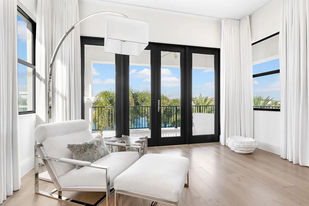 This 6-bedroom, 8-bathroom palazzo estate is located at 17206 Brulee Breeze Way, Boca Raton, Florida, and boasts 7,732 square feet of luxurious living space. The house is designed to offer clean lines, sophisticated design, and stunning finishes, with each space masterfully curated for luxurious living and gracious entertaining.