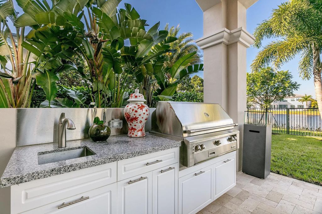 This 6-bedroom, 8-bathroom palazzo estate is located at 17206 Brulee Breeze Way, Boca Raton, Florida, and boasts 7,732 square feet of luxurious living space. The house is designed to offer clean lines, sophisticated design, and stunning finishes, with each space masterfully curated for luxurious living and gracious entertaining.