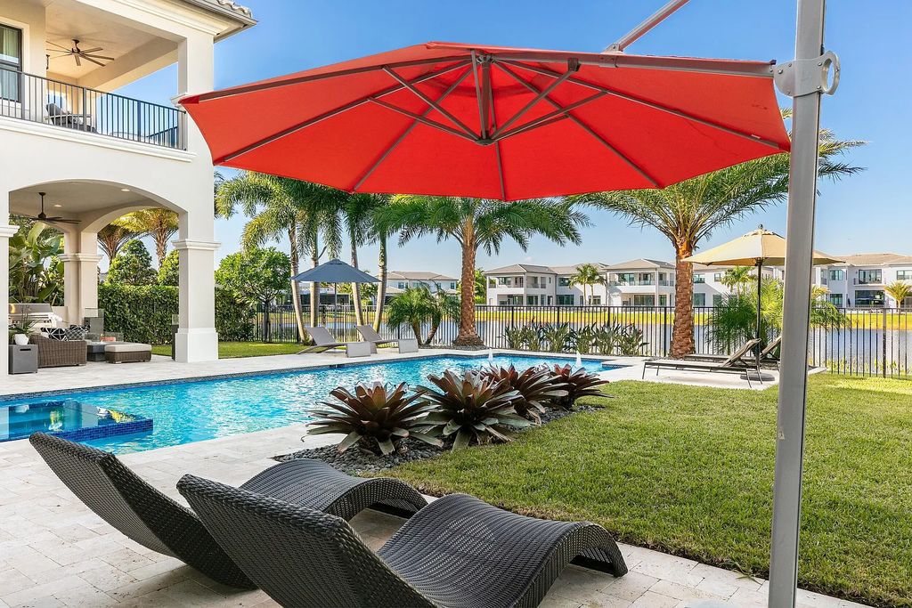 This 6-bedroom, 8-bathroom palazzo estate is located at 17206 Brulee Breeze Way, Boca Raton, Florida, and boasts 7,732 square feet of luxurious living space. The house is designed to offer clean lines, sophisticated design, and stunning finishes, with each space masterfully curated for luxurious living and gracious entertaining.