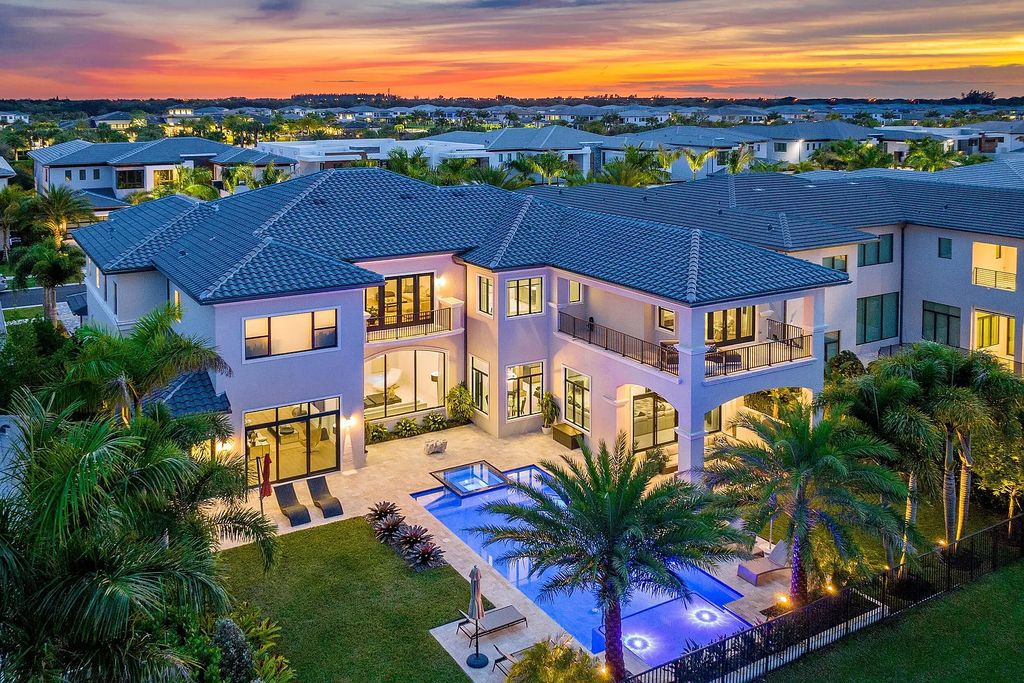 This 6-bedroom, 8-bathroom palazzo estate is located at 17206 Brulee Breeze Way, Boca Raton, Florida, and boasts 7,732 square feet of luxurious living space. The house is designed to offer clean lines, sophisticated design, and stunning finishes, with each space masterfully curated for luxurious living and gracious entertaining.
