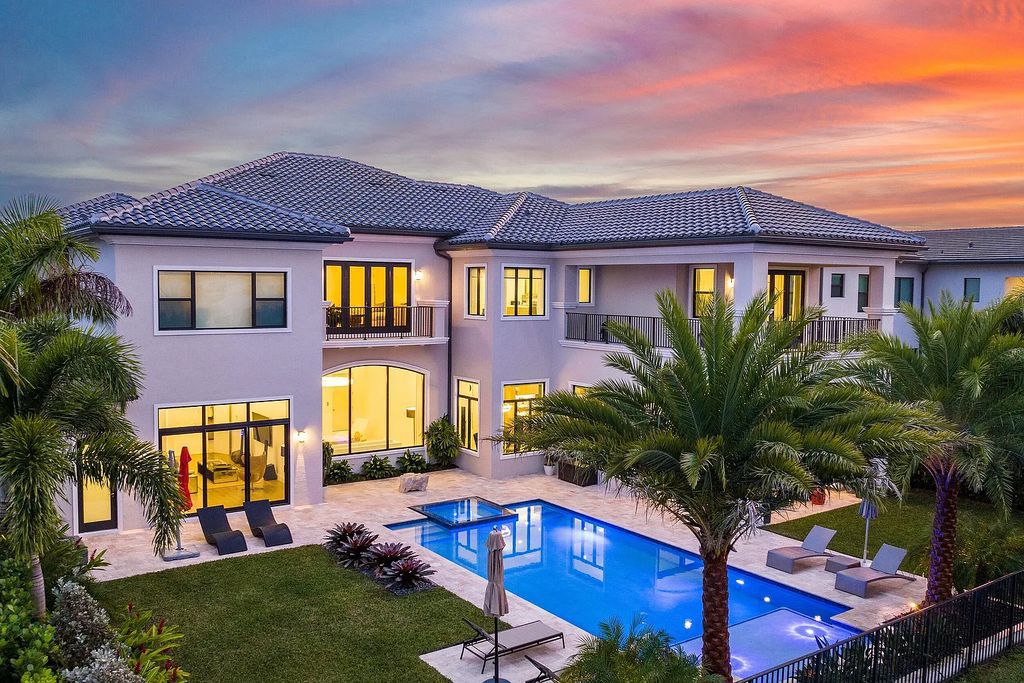 This 6-bedroom, 8-bathroom palazzo estate is located at 17206 Brulee Breeze Way, Boca Raton, Florida, and boasts 7,732 square feet of luxurious living space. The house is designed to offer clean lines, sophisticated design, and stunning finishes, with each space masterfully curated for luxurious living and gracious entertaining.