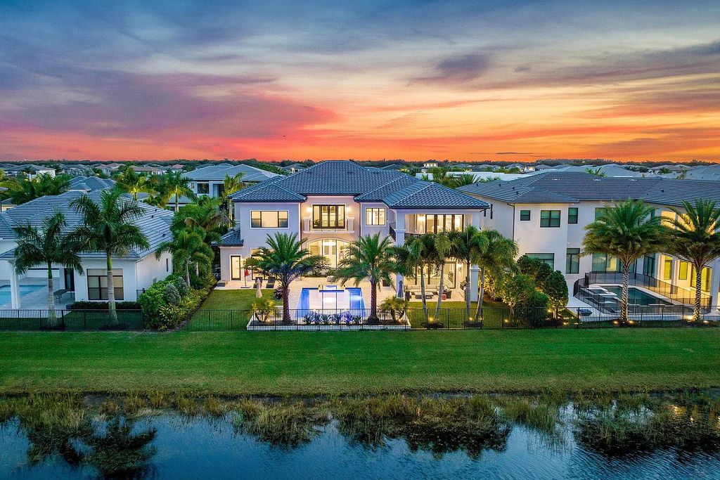 This 6-bedroom, 8-bathroom palazzo estate is located at 17206 Brulee Breeze Way, Boca Raton, Florida, and boasts 7,732 square feet of luxurious living space. The house is designed to offer clean lines, sophisticated design, and stunning finishes, with each space masterfully curated for luxurious living and gracious entertaining.