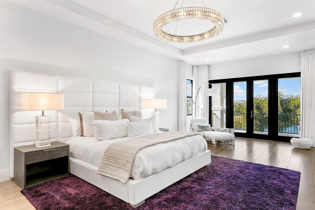 This 6-bedroom, 8-bathroom palazzo estate is located at 17206 Brulee Breeze Way, Boca Raton, Florida, and boasts 7,732 square feet of luxurious living space. The house is designed to offer clean lines, sophisticated design, and stunning finishes, with each space masterfully curated for luxurious living and gracious entertaining.