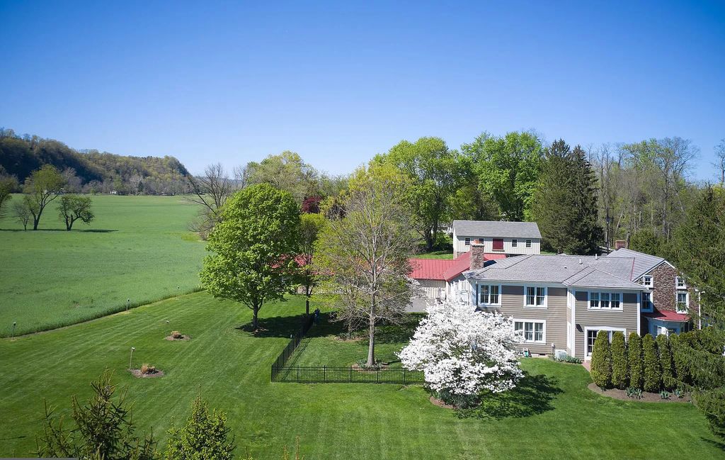 The Estate in Upper Black Eddy is a luxurious home undergone a dedicated, comprehensive and accurate restoration now available for sale. This home located at 1005 River Rd, Upper Black Eddy, Pennsylvania; offering 03 bedrooms and 03 bathrooms with 3,452 square feet of living spaces.
