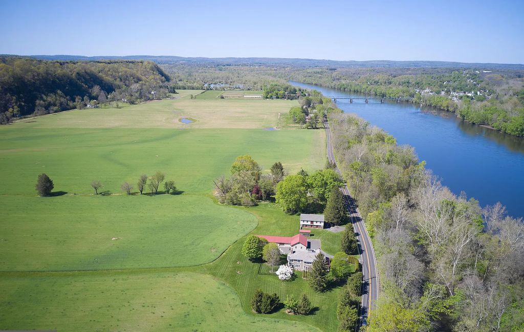 The Estate in Upper Black Eddy is a luxurious home undergone a dedicated, comprehensive and accurate restoration now available for sale. This home located at 1005 River Rd, Upper Black Eddy, Pennsylvania; offering 03 bedrooms and 03 bathrooms with 3,452 square feet of living spaces.