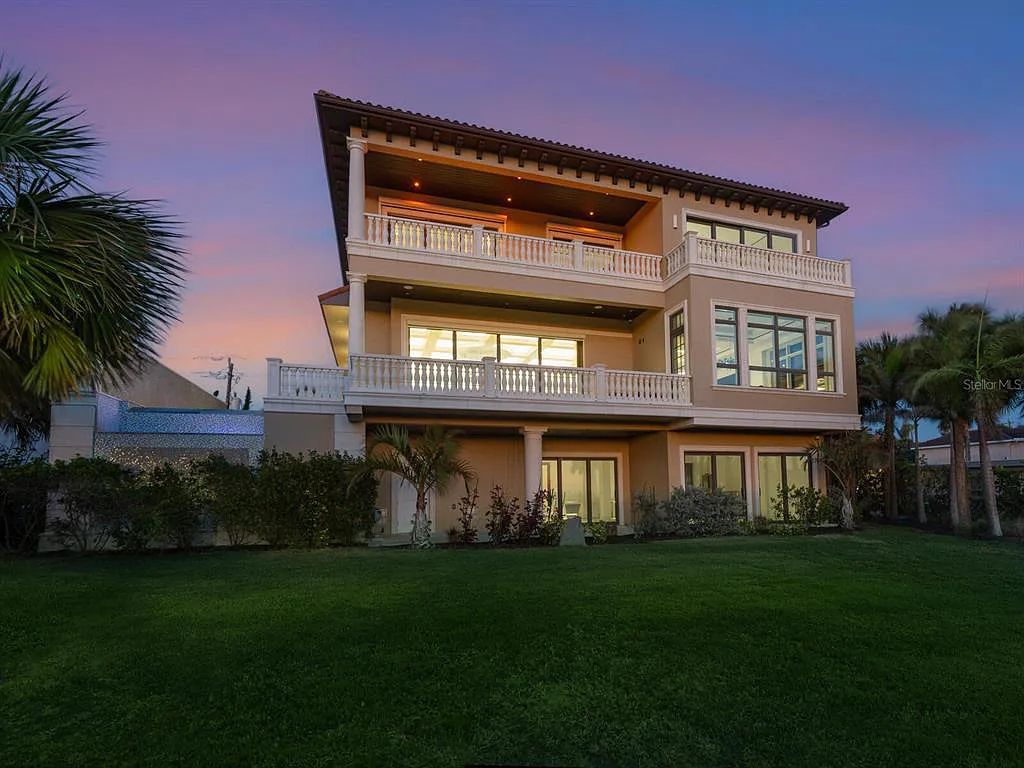 This stunning 2018-built gulf front estate is located at 3909 Casey Key Road in Nokomis, Florida. Boasting 4 bedrooms, 6 bathrooms, and a sprawling living space of 6,335 square feet on a 0.53-acre lot, this refined and elegant home offers breathtaking views of the Gulf of Mexico from the expansive walls of glass.