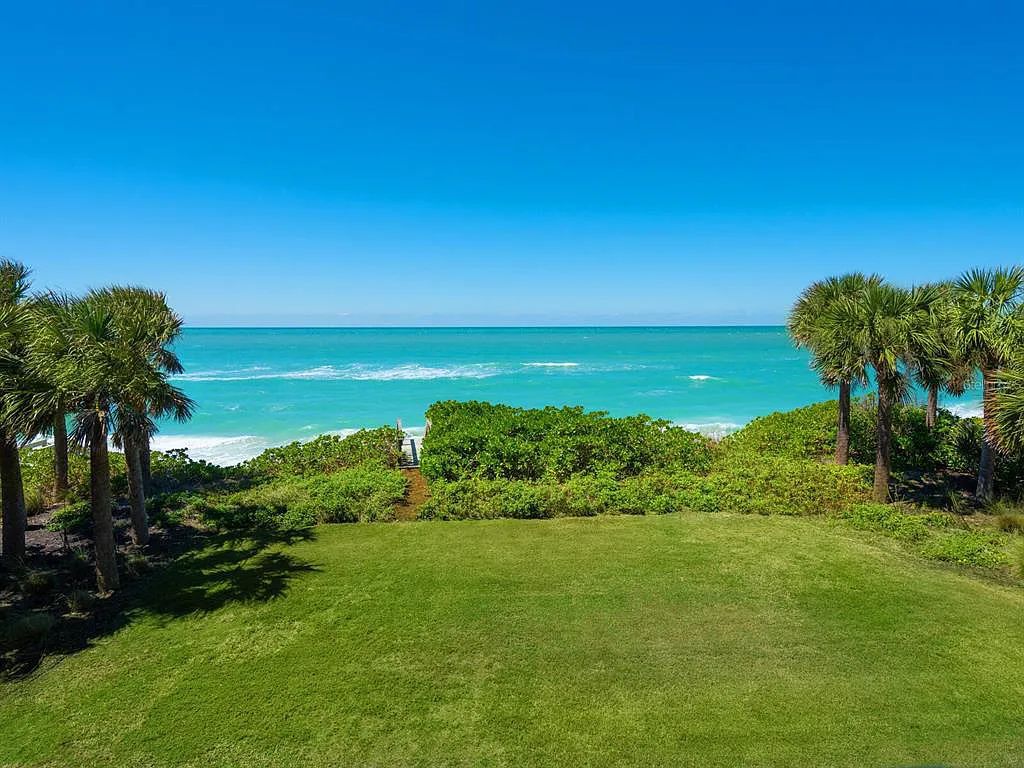 This stunning 2018-built gulf front estate is located at 3909 Casey Key Road in Nokomis, Florida. Boasting 4 bedrooms, 6 bathrooms, and a sprawling living space of 6,335 square feet on a 0.53-acre lot, this refined and elegant home offers breathtaking views of the Gulf of Mexico from the expansive walls of glass.