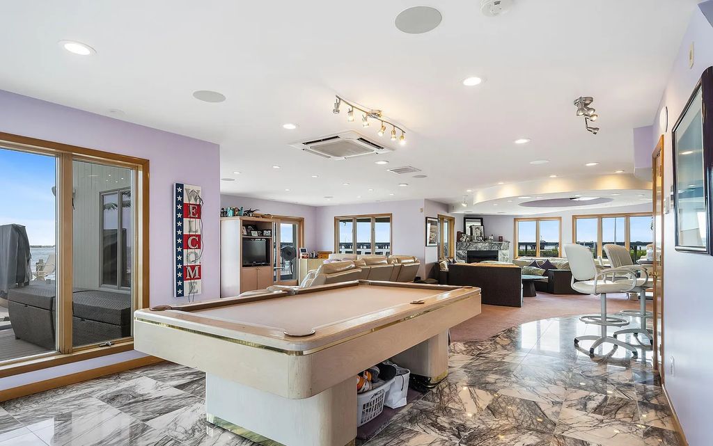 The Estate in Toms River is a luxurious home featuring many custom details in an open layout, designed for entertaining now available for sale. This home located at 3465 Maritime Drive, Toms River, New Jersey; offering 06 bedrooms and 05 bathrooms with 4,760 square feet of living spaces.