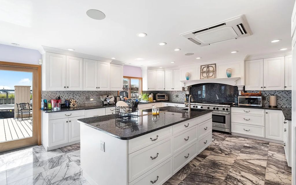 The Estate in Toms River is a luxurious home featuring many custom details in an open layout, designed for entertaining now available for sale. This home located at 3465 Maritime Drive, Toms River, New Jersey; offering 06 bedrooms and 05 bathrooms with 4,760 square feet of living spaces.