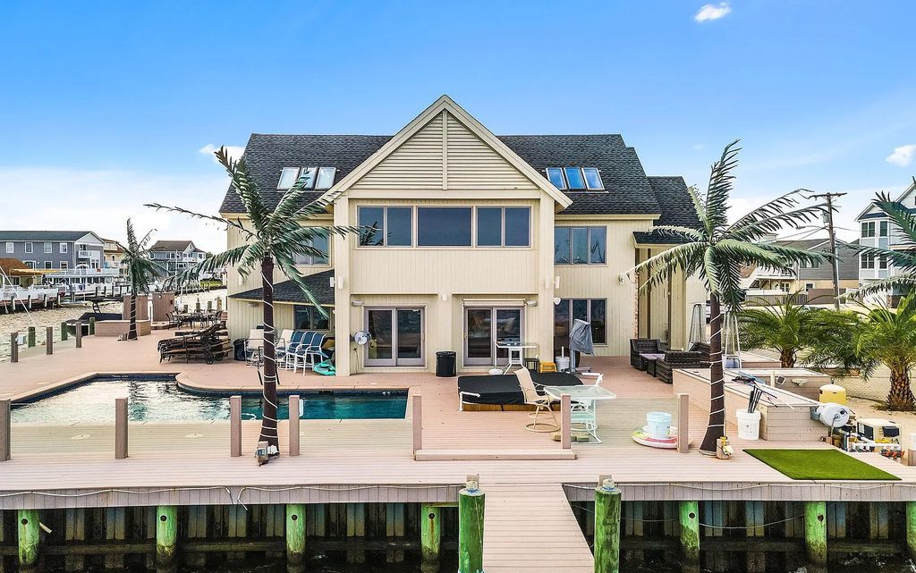 The Estate in Toms River is a luxurious home featuring many custom details in an open layout, designed for entertaining now available for sale. This home located at 3465 Maritime Drive, Toms River, New Jersey; offering 06 bedrooms and 05 bathrooms with 4,760 square feet of living spaces.