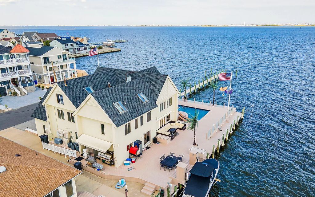 The Estate in Toms River is a luxurious home featuring many custom details in an open layout, designed for entertaining now available for sale. This home located at 3465 Maritime Drive, Toms River, New Jersey; offering 06 bedrooms and 05 bathrooms with 4,760 square feet of living spaces.