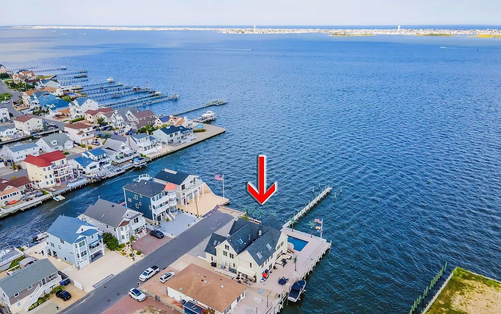 The Estate in Toms River is a luxurious home featuring many custom details in an open layout, designed for entertaining now available for sale. This home located at 3465 Maritime Drive, Toms River, New Jersey; offering 06 bedrooms and 05 bathrooms with 4,760 square feet of living spaces.