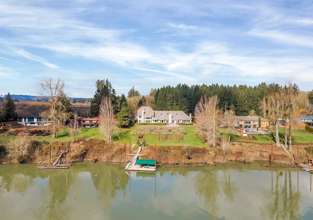 The Estate in Wilsonville is a luxurious home providing a secluded retreat yet with maximal river views now available for sale. This home located at 12300 SW Riverview Ln, Wilsonville, Oregon; offering 04 bedrooms and 04 bathrooms with 5,886 square feet of living spaces.