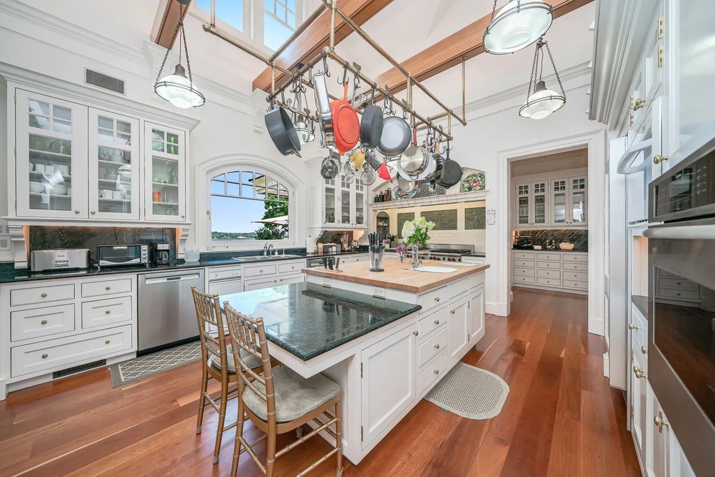 The Estate in Great Neck is build by award-winning architecture firm, Shope Reno Wharton Associates, now available for sale. This home located at 227 Dock Lane, Great Neck, New York
