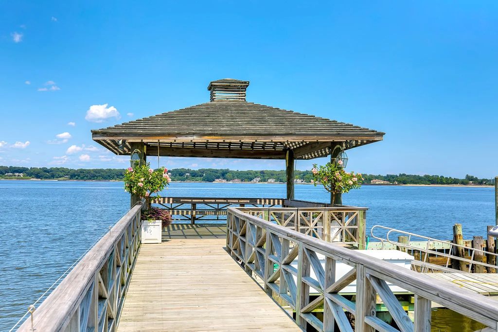 The Estate in Great Neck is build by award-winning architecture firm, Shope Reno Wharton Associates, now available for sale. This home located at 227 Dock Lane, Great Neck, New York
