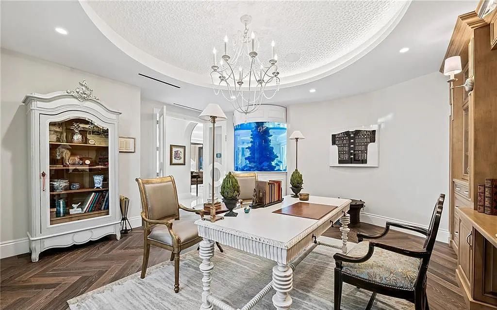 Welcome to 633 Isle of Palms Drive in Fort Lauderdale, Florida, where luxury living meets bespoke grandeur. This custom-built residence features 5 bedrooms, 8 bathrooms, and 7,970 square feet of living space on a 0.30-acre lot with a 100-foot dock, 21K lift, and a resort-like salt pool and spa.