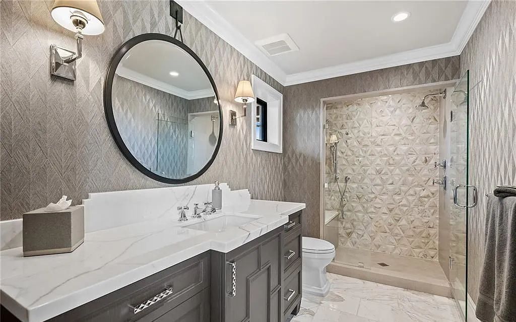 Welcome to 633 Isle of Palms Drive in Fort Lauderdale, Florida, where luxury living meets bespoke grandeur. This custom-built residence features 5 bedrooms, 8 bathrooms, and 7,970 square feet of living space on a 0.30-acre lot with a 100-foot dock, 21K lift, and a resort-like salt pool and spa.