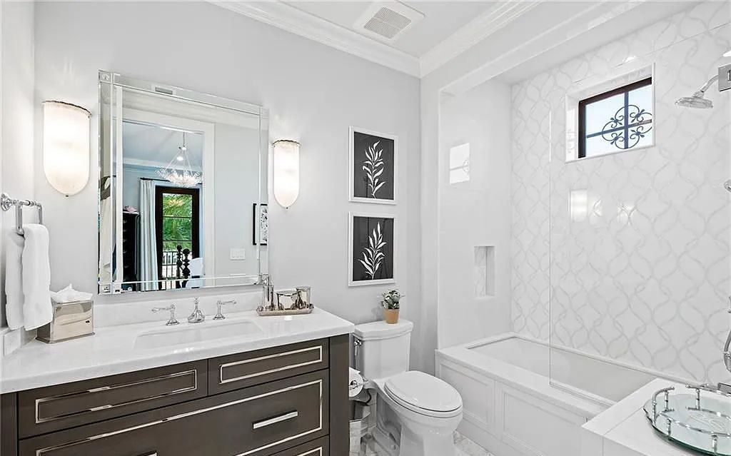 Welcome to 633 Isle of Palms Drive in Fort Lauderdale, Florida, where luxury living meets bespoke grandeur. This custom-built residence features 5 bedrooms, 8 bathrooms, and 7,970 square feet of living space on a 0.30-acre lot with a 100-foot dock, 21K lift, and a resort-like salt pool and spa.