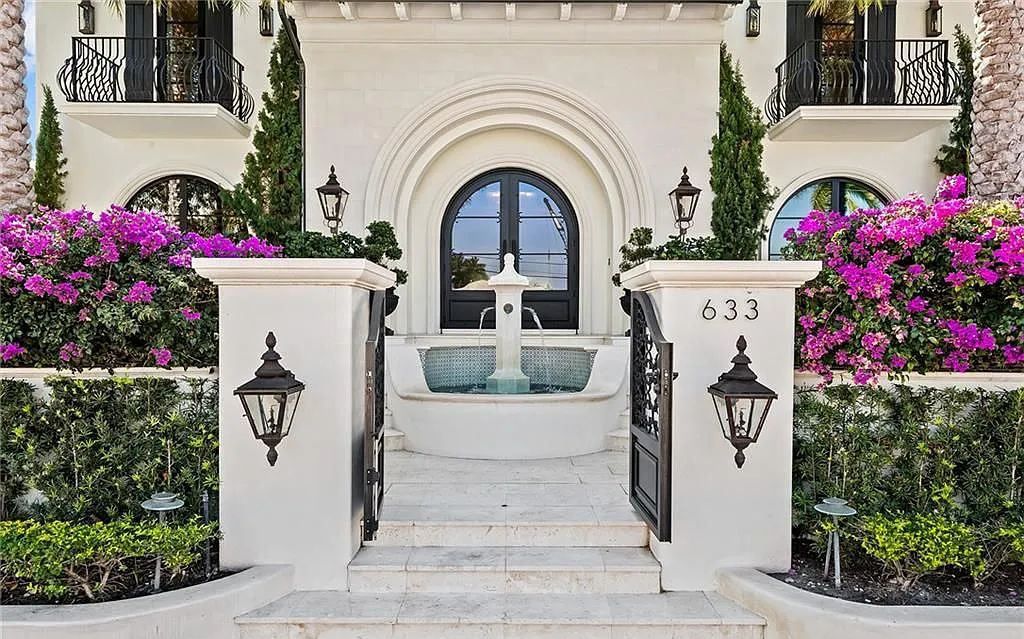 Welcome to 633 Isle of Palms Drive in Fort Lauderdale, Florida, where luxury living meets bespoke grandeur. This custom-built residence features 5 bedrooms, 8 bathrooms, and 7,970 square feet of living space on a 0.30-acre lot with a 100-foot dock, 21K lift, and a resort-like salt pool and spa.