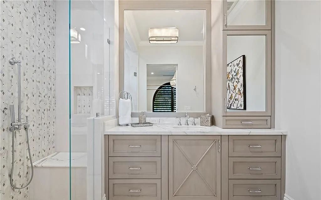 Welcome to 633 Isle of Palms Drive in Fort Lauderdale, Florida, where luxury living meets bespoke grandeur. This custom-built residence features 5 bedrooms, 8 bathrooms, and 7,970 square feet of living space on a 0.30-acre lot with a 100-foot dock, 21K lift, and a resort-like salt pool and spa.