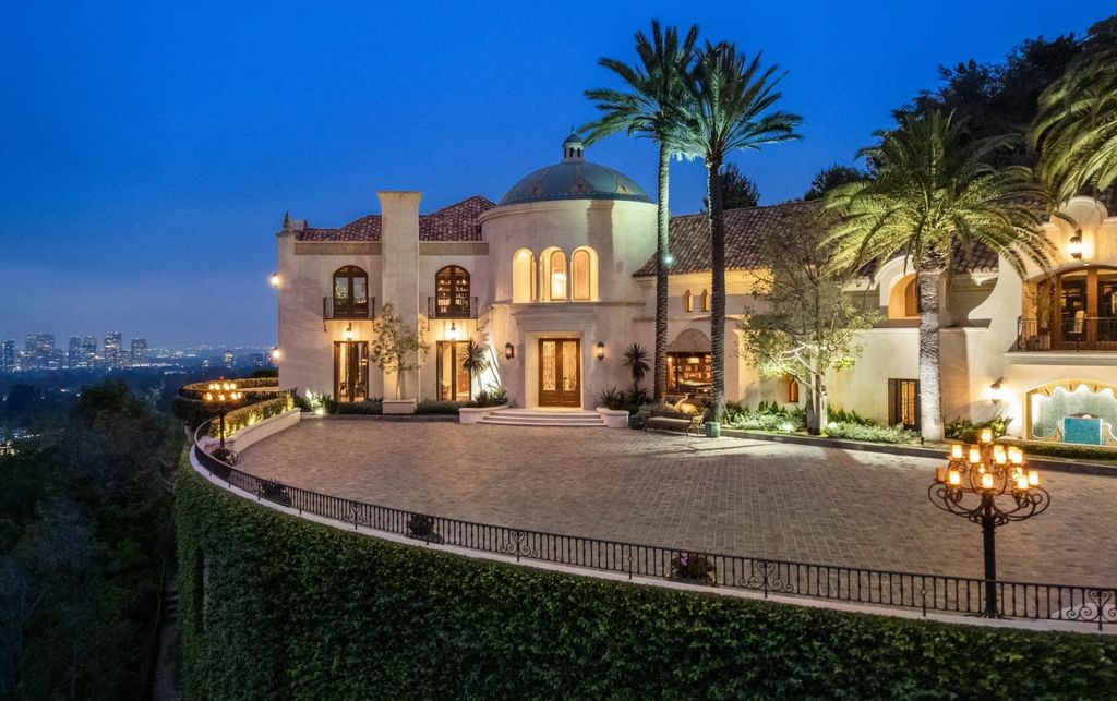 Experience opulent living in Beverly Hills' most desirable zip code with The Cielo Estate. This palatial Andalusian-style masterpiece features 9 bedrooms, 18 bathrooms, 21,000 sq. ft. living space, and 3.60 acres lot size. Enjoy breathtaking city and ocean views, a detached guest house, movie theatre, spa, gym, billiards room, bar, and a 75-yard pool with 3 waterfalls, 2 spas, a 35-foot water slide, and more.