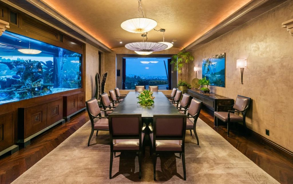 Experience opulent living in Beverly Hills' most desirable zip code with The Cielo Estate. This palatial Andalusian-style masterpiece features 9 bedrooms, 18 bathrooms, 21,000 sq. ft. living space, and 3.60 acres lot size. Enjoy breathtaking city and ocean views, a detached guest house, movie theatre, spa, gym, billiards room, bar, and a 75-yard pool with 3 waterfalls, 2 spas, a 35-foot water slide, and more.