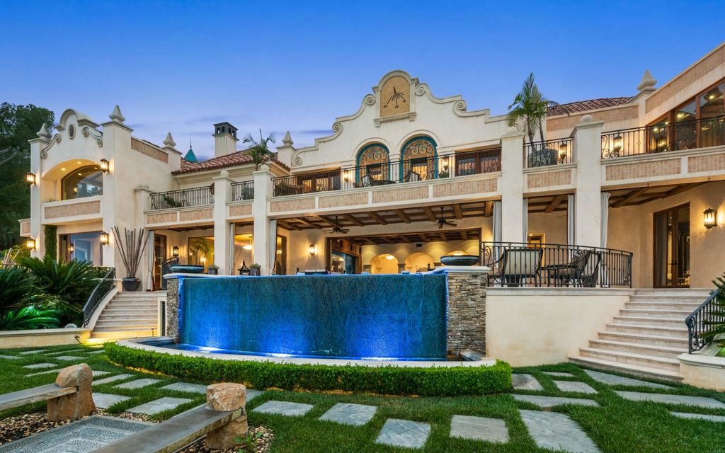 Experience opulent living in Beverly Hills' most desirable zip code with The Cielo Estate. This palatial Andalusian-style masterpiece features 9 bedrooms, 18 bathrooms, 21,000 sq. ft. living space, and 3.60 acres lot size. Enjoy breathtaking city and ocean views, a detached guest house, movie theatre, spa, gym, billiards room, bar, and a 75-yard pool with 3 waterfalls, 2 spas, a 35-foot water slide, and more.