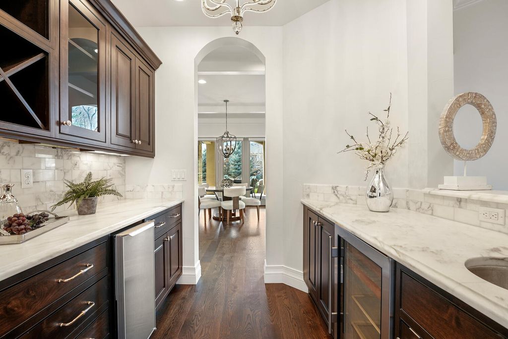 1110 E Layton Avenue Home in Cherry Hills Village, Colorado. This stunning home in the heart of Old Cherry Hills Village offers classical form and style with modern renovations and top-of-the-line finishes. The spacious layout boasts vaulted ceilings and private spaces with unique views from every window.
