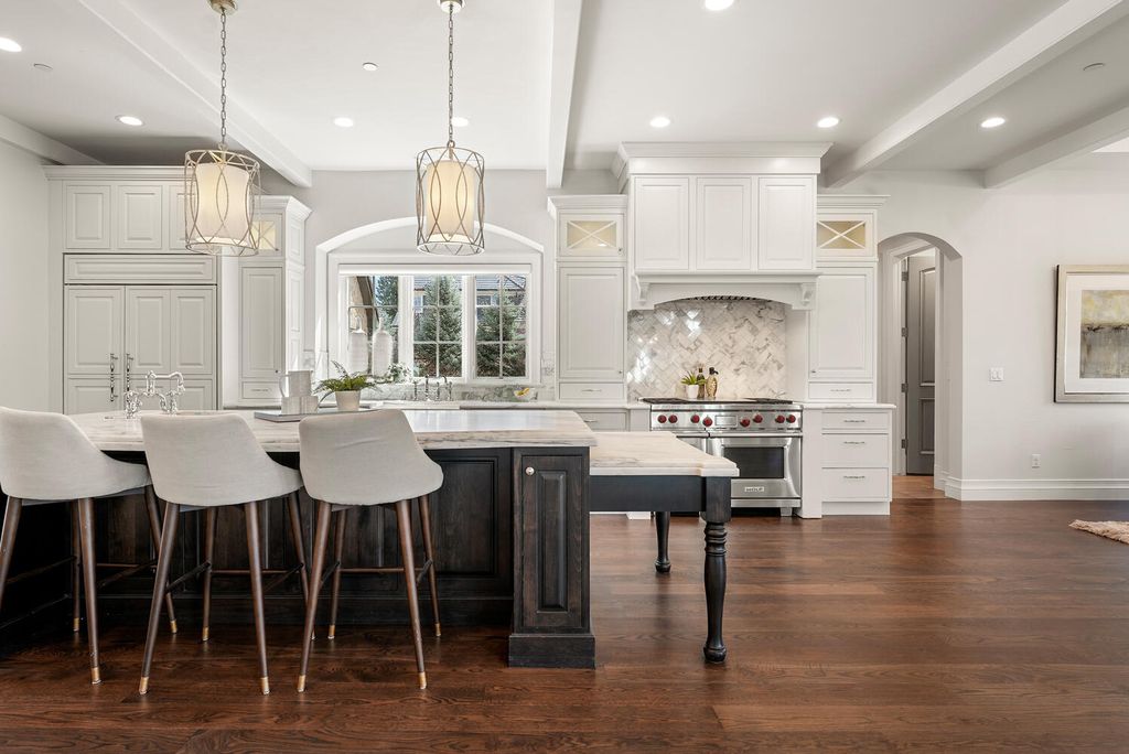 1110 E Layton Avenue Home in Cherry Hills Village, Colorado. This stunning home in the heart of Old Cherry Hills Village offers classical form and style with modern renovations and top-of-the-line finishes. The spacious layout boasts vaulted ceilings and private spaces with unique views from every window.