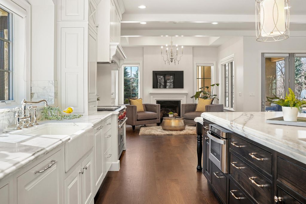 1110 E Layton Avenue Home in Cherry Hills Village, Colorado. This stunning home in the heart of Old Cherry Hills Village offers classical form and style with modern renovations and top-of-the-line finishes. The spacious layout boasts vaulted ceilings and private spaces with unique views from every window.