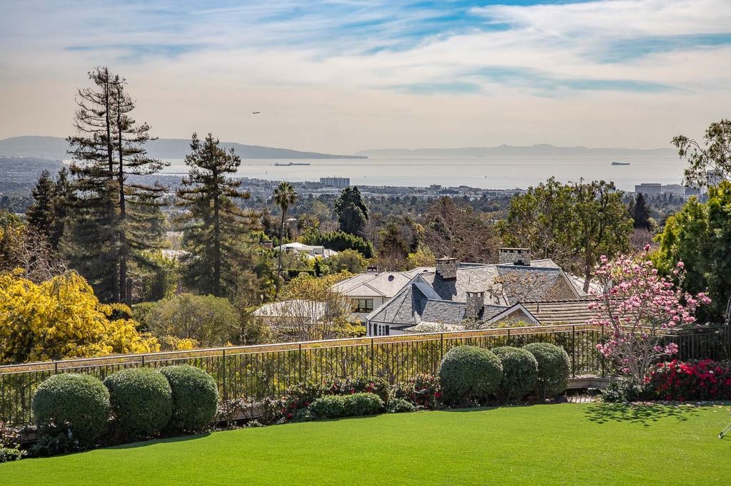 This stunning estate located at 1678 Alta Mura Rd in Pacific Palisades, California 90272, is a true gem of the Palisades Riviera. Boasting 8 bedrooms, 14 bathrooms, and a living space of 16,000 square feet on a 1.08-acre lot, this LEED-certified compound offers luxury and privacy in an unbeatable location.