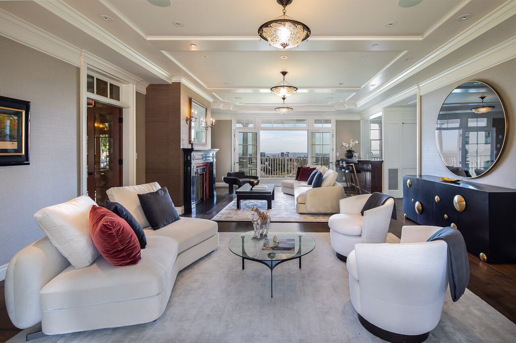 This stunning estate located at 1678 Alta Mura Rd in Pacific Palisades, California 90272, is a true gem of the Palisades Riviera. Boasting 8 bedrooms, 14 bathrooms, and a living space of 16,000 square feet on a 1.08-acre lot, this LEED-certified compound offers luxury and privacy in an unbeatable location.