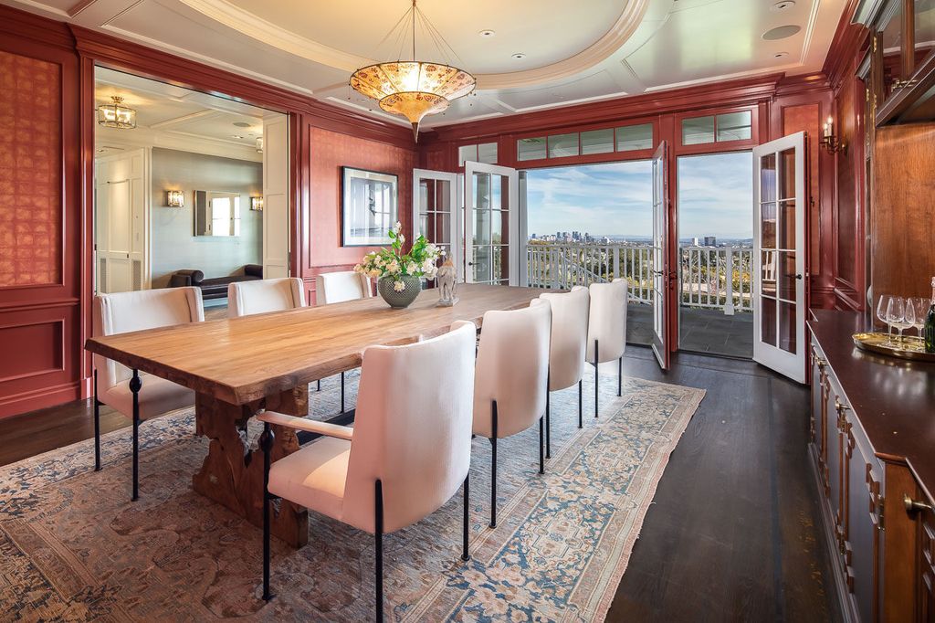 This stunning estate located at 1678 Alta Mura Rd in Pacific Palisades, California 90272, is a true gem of the Palisades Riviera. Boasting 8 bedrooms, 14 bathrooms, and a living space of 16,000 square feet on a 1.08-acre lot, this LEED-certified compound offers luxury and privacy in an unbeatable location.