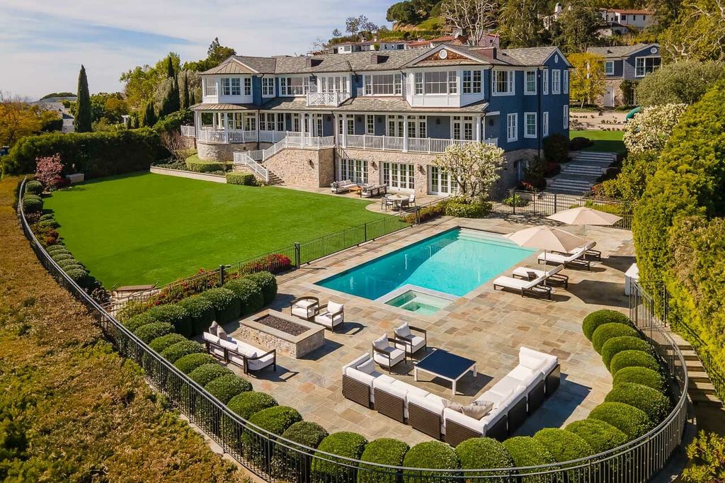 This stunning estate located at 1678 Alta Mura Rd in Pacific Palisades, California 90272, is a true gem of the Palisades Riviera. Boasting 8 bedrooms, 14 bathrooms, and a living space of 16,000 square feet on a 1.08-acre lot, this LEED-certified compound offers luxury and privacy in an unbeatable location.