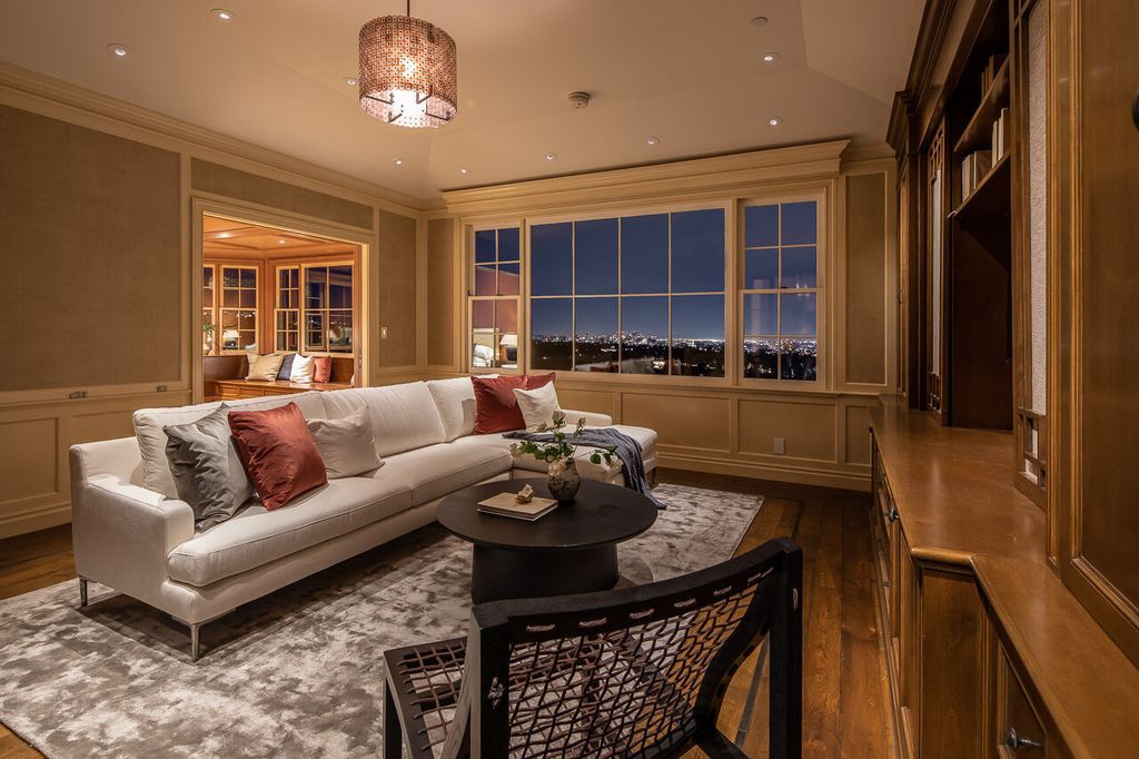 This stunning estate located at 1678 Alta Mura Rd in Pacific Palisades, California 90272, is a true gem of the Palisades Riviera. Boasting 8 bedrooms, 14 bathrooms, and a living space of 16,000 square feet on a 1.08-acre lot, this LEED-certified compound offers luxury and privacy in an unbeatable location.