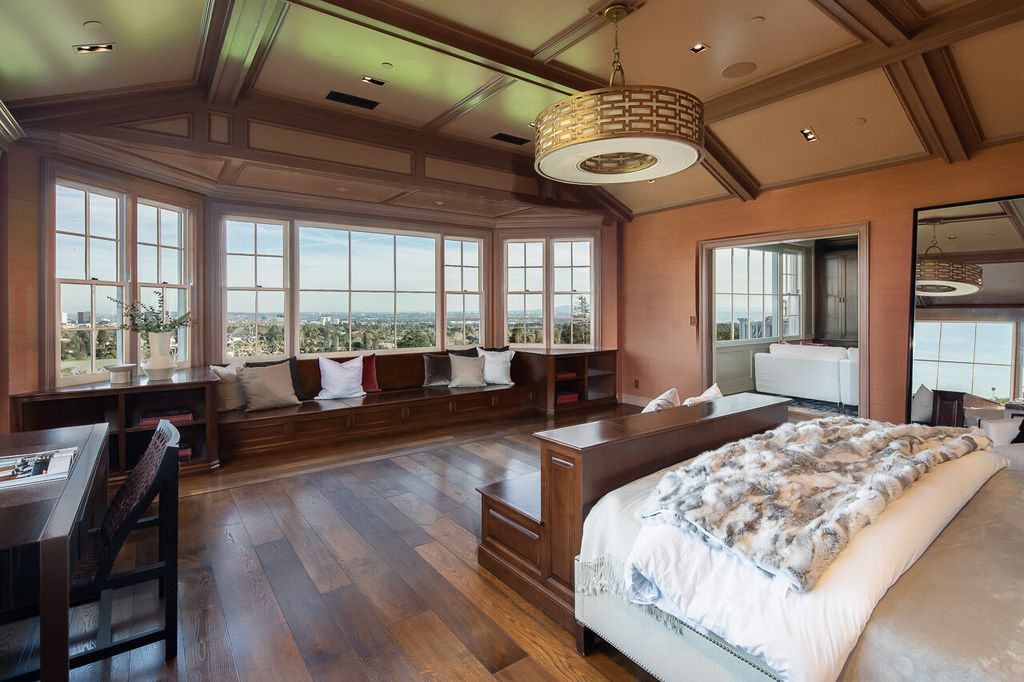 This stunning estate located at 1678 Alta Mura Rd in Pacific Palisades, California 90272, is a true gem of the Palisades Riviera. Boasting 8 bedrooms, 14 bathrooms, and a living space of 16,000 square feet on a 1.08-acre lot, this LEED-certified compound offers luxury and privacy in an unbeatable location.